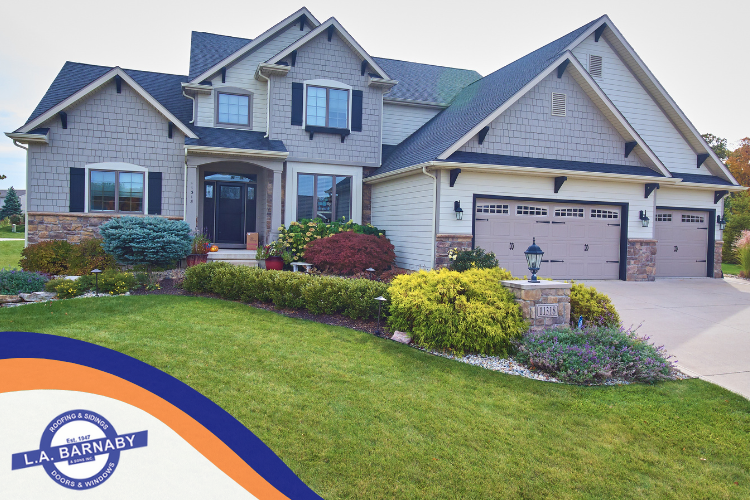 A home with different types of siding materials during winter - L.A. Barnaby