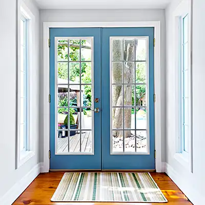 Blue patio door seen from the inside of a home