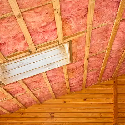 Pink insulation installed on an attic's roof
